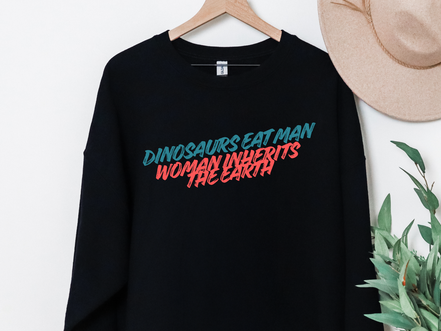 "Dinosaurs Eat Man Woman Inherits The Earth" Crewneck