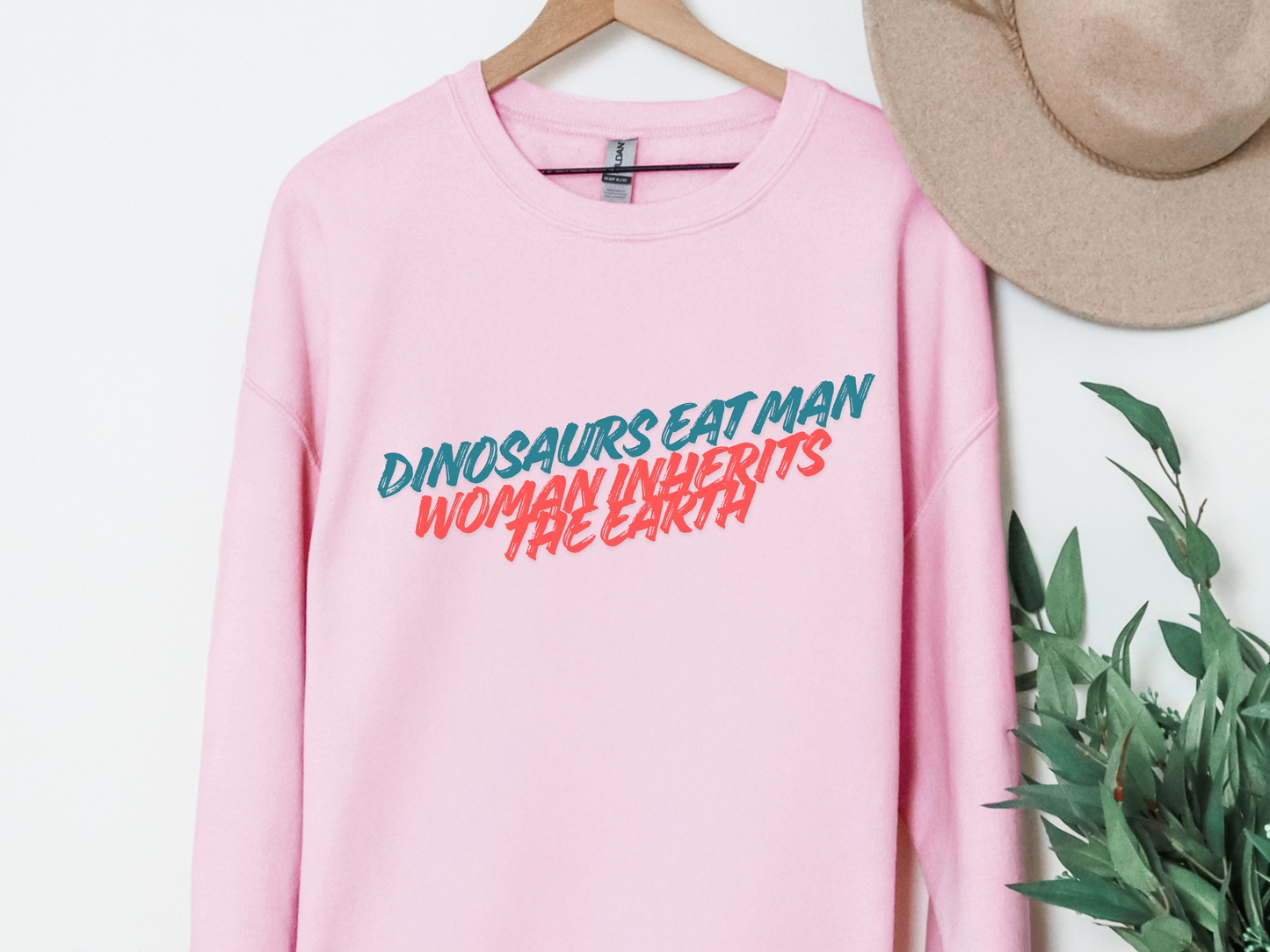 "Dinosaurs Eat Man Woman Inherits The Earth" Crewneck